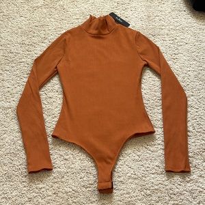 Lulus Wilde rust orange ribbed long sleeve mock neck bodysuit